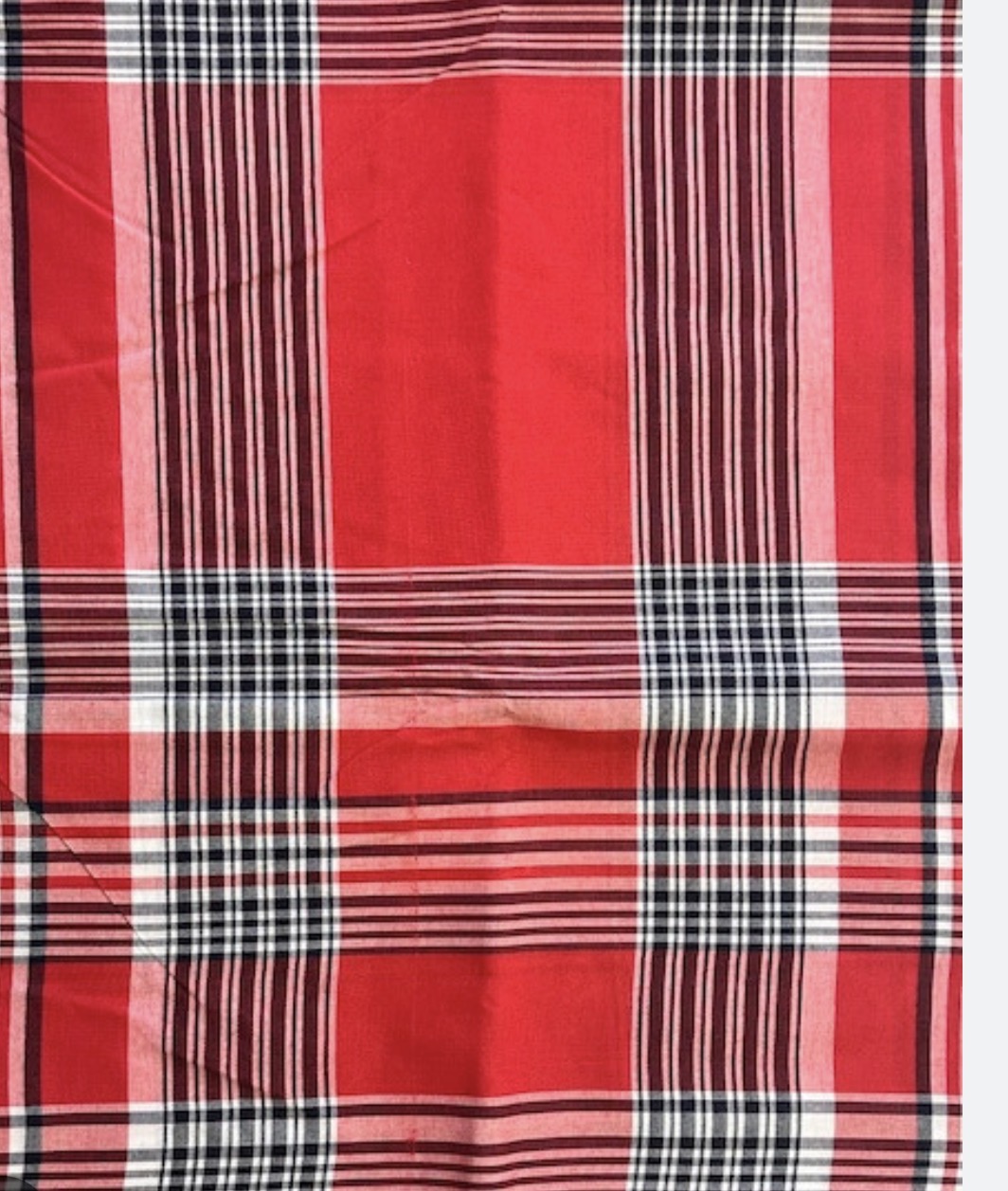 Red plaid Jioji cloth, a traditional Akwete woven textile from Nigeria